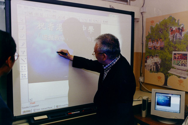 Mr.Tung Trying SMART board.JPG